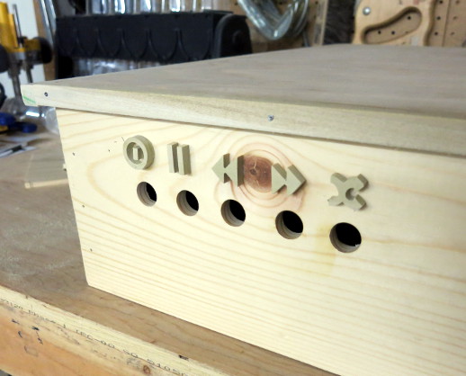 Glockenspiel box with scrollsawed button labels glued on