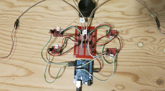 The circuit, mounted on the plywood.