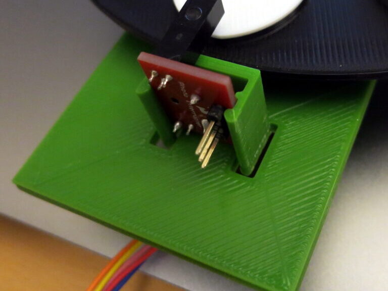 printed clip, holding the photo interrupter