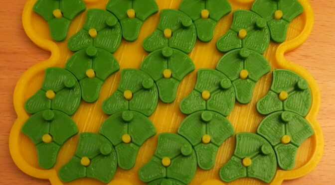 The 3D Printed 25 Lotus Flowers pieces and board