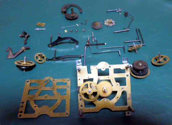 A disassembled cuckoo clock