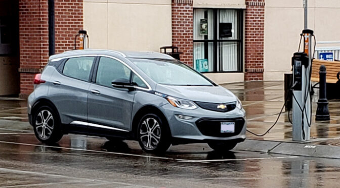 A Chevrolet Bolt charging near the Hillsboro Civic Center